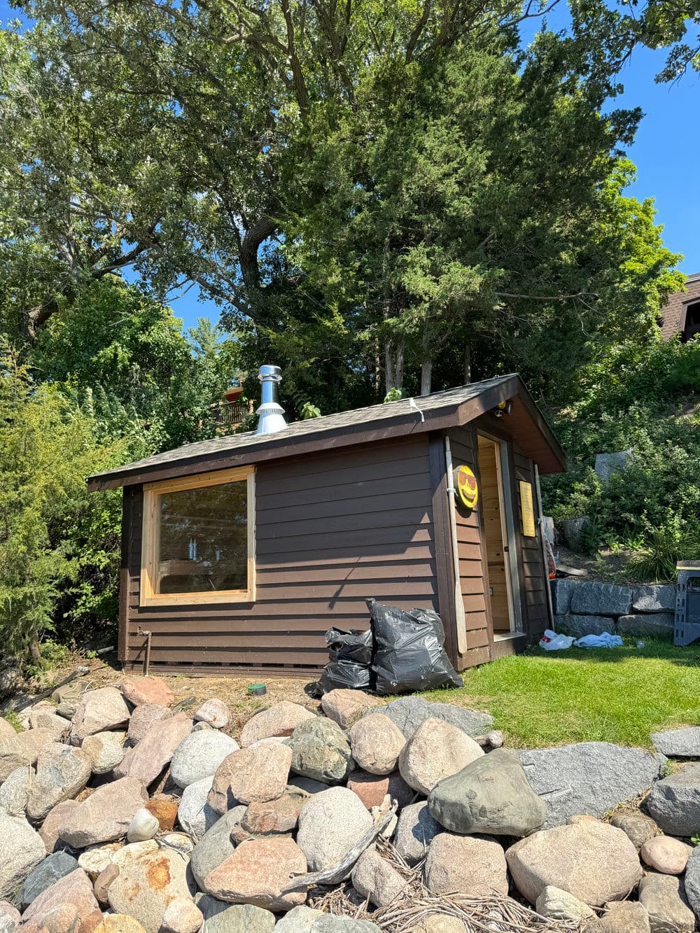 Old Storage Shed Becomes Cozy Sauna by Clearwater Lake image